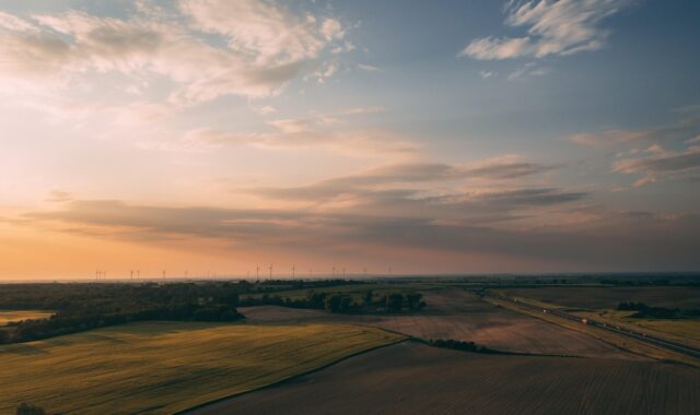 fields, countryside, sunset, sunrise, farm, rural, nature, horizon, sky, clouds, dusk, dawn, windmills, wind farm, sustainability, industry, environment, europe, panorama, aerial view, farm, sustainability, sustainability, sustainability, sustainability, sustainability